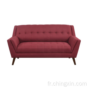 Canapé de loisirs en tissu rouge à deux places avec pieds en bois massif